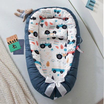 réducteur de lit bébé tracteur