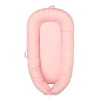 réducteur de lit cocon évolutif  rose